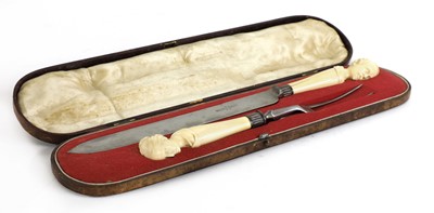 Lot 162 - A cased carving set