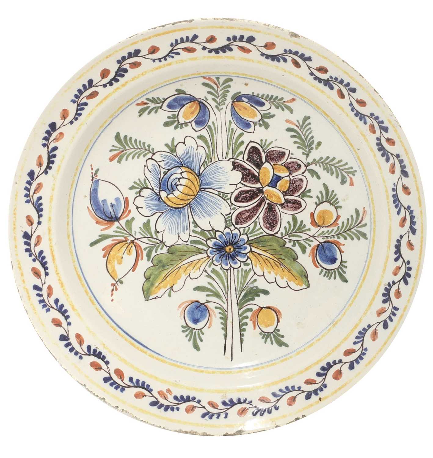 Lot 85 - A French faience charger