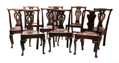 Lot 147 - A set of five ash and elm panel seat dining chairs