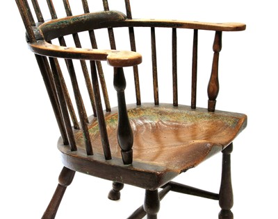 Lot 92 - An ash and elm comb back Windsor armchair