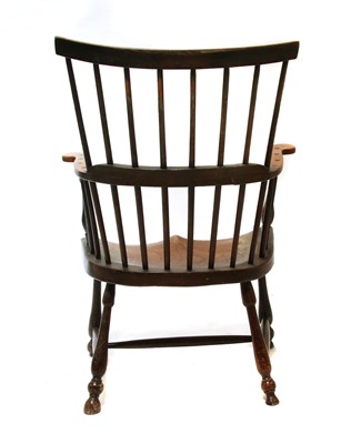 Lot 92 - An ash and elm comb back Windsor armchair