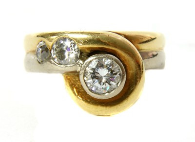 Lot 85 - An 18ct two colour gold diamond ring