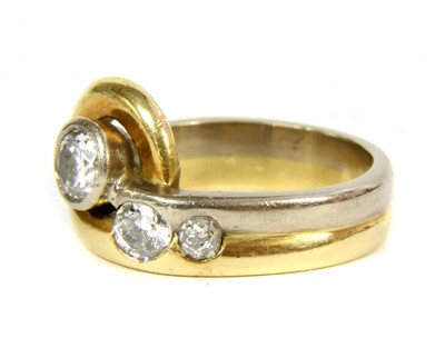 Lot 85 - An 18ct two colour gold diamond ring