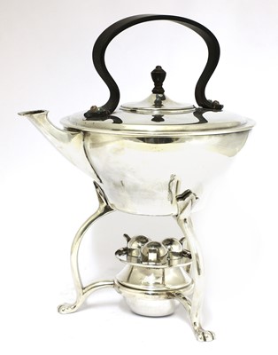 Lot 105 - An Arts and Crafts silver-plated kettle and burner on stand