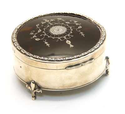 Lot 177 - A George V silver piqué work tortoiseshell jewellery box