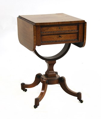 Lot 571 - A Regency rosewood pembroke work table
