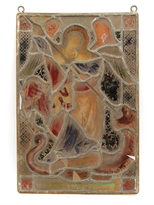 Lot 33 - A stained glass panel of an angel lancing a dragon