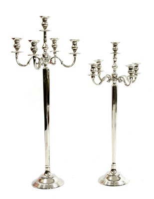 Lot 615 - A pair of contemporary large graduated floor standing five branch candelabra