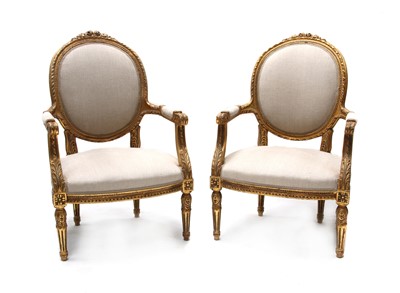 Lot 607 - A pair of Continental giltwood open armchairs