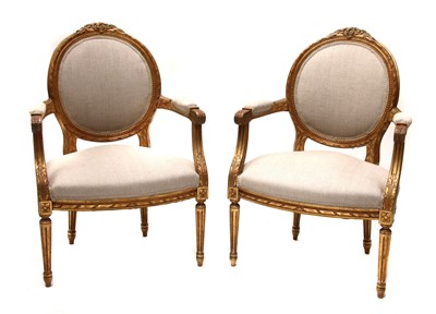 Lot 614 - A pair of giltwood open armchairs