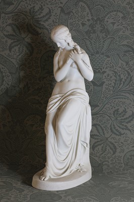 Lot 378 - A Copeland Parian figure of a lady holding a dove