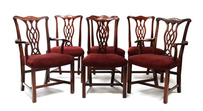 Lot 951 - A matched set of fourteen Chippendale style mahogany dining chairs