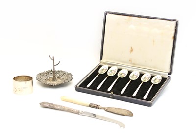 Lot 173 - A cased set of six silver and guilloche enamel coffee spoons