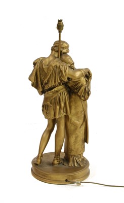 Lot 542 - A figural plaster table lamp