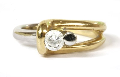 Lot 227 - A two colour gold single stone cubic zirconia ring