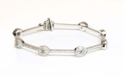 Lot 427 - A Continental white gold diamond set bracelet