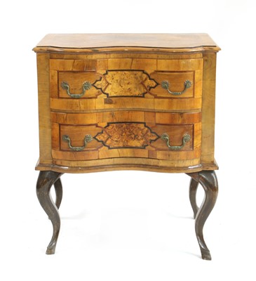 Lot 579 - A small walnut and beechwood South German chest