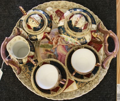Lot 140 - A Continental porcelain tea set and tray