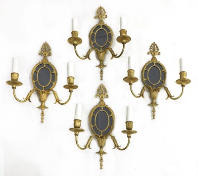 Lot 893 - A set of four George II design gilt metal girandoles