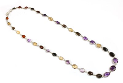 Lot 206 - A silver assorted gemstone graduated rivière necklace
