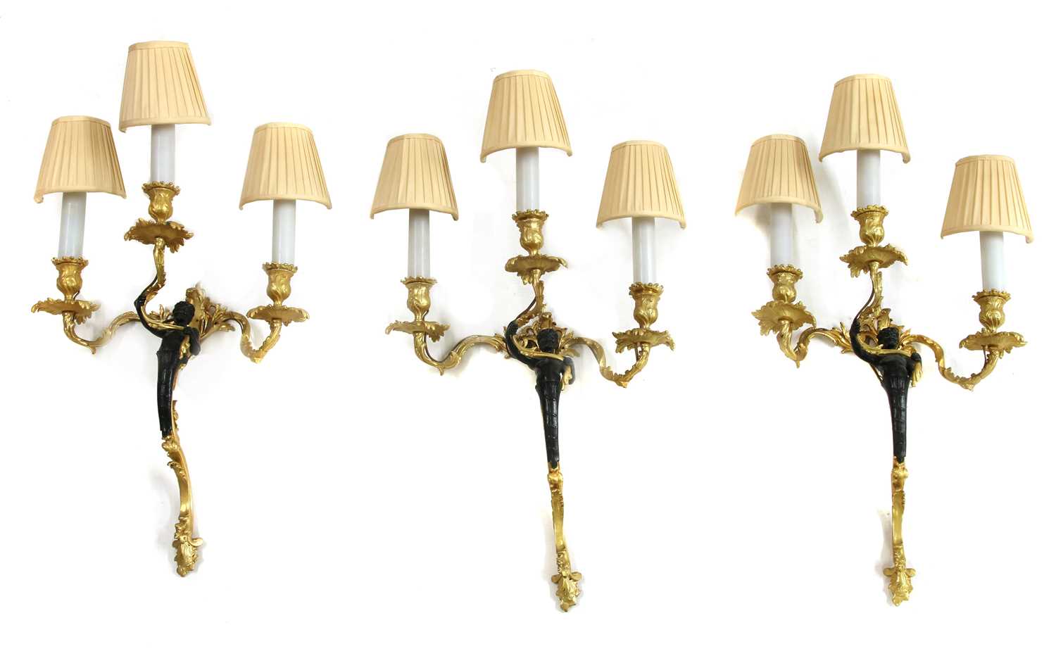 Lot 77 - A set of three Louis XV design bronze and gilt-bronze wall lights