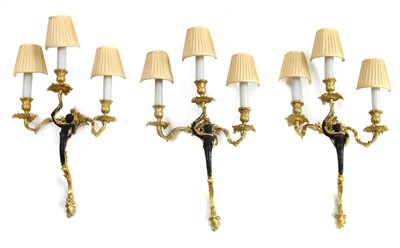 Lot 77A - A set of three Louis XV design bronze and gilt-bronze wall lights