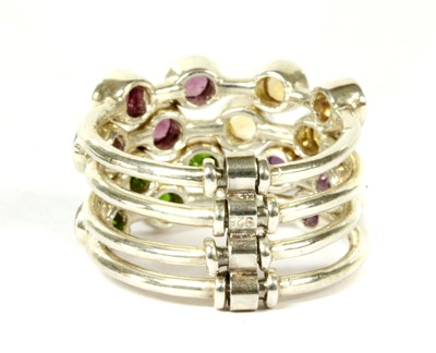 Lot 201 - A silver assorted gemstone four row harem ring