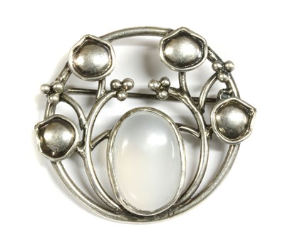Lot 191 - An Arts & Crafts style moonstone brooch