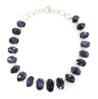 Lot 60 - A silver graduated sapphire necklace