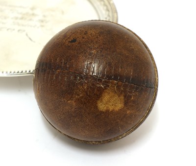 Lot 23 - A Victorian silver-mounted cricket ball