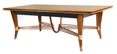 Lot 401 - An Art Deco maple draw-leaf dining table