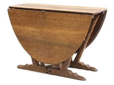 Lot 260 - An oak gateleg table
