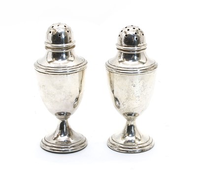 Lot 151 - A pair of George V casters of urn design