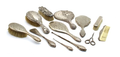 Lot 136 - A collection of English and Continental silver backed dressing table items