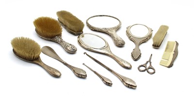 Lot 136 - A collection of English and Continental silver backed dressing table items