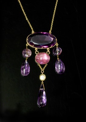 Lot 78 - An Edwardian amethyst, paste and blister pearl necklace