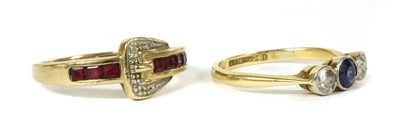 Lot 36 - A gold sapphire and diamond three stone ring