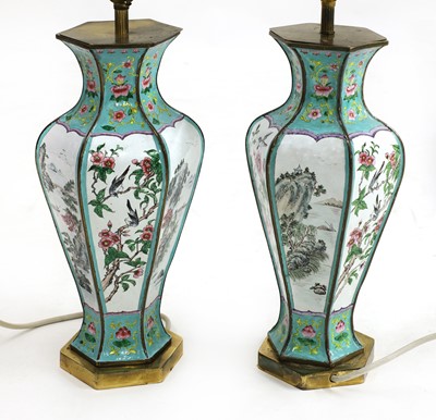 Lot 254 - A pair of Chinese Canton enamelled table lamps and shades