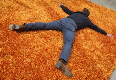 Lot 397 - An Alton-Brooke ginger thick shag pile rug