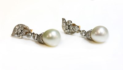 Lot 218 - A pair of cultured South Sea pearl and diamond drop earrings