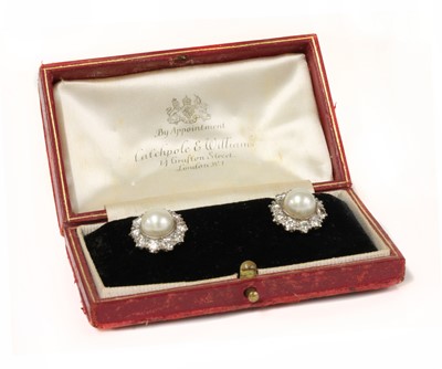 Lot 229 - A pair of cultured pearl and diamond cluster earrings