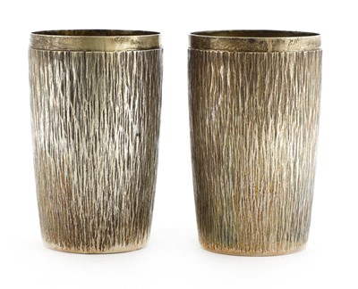 Lot 196 - A pair of silver beakers
