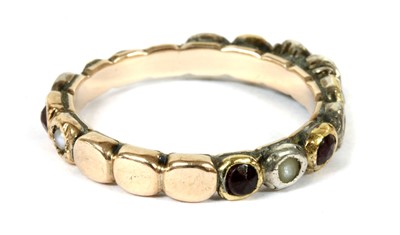 Lot 2 - A Georgian silver and gold, garnet, split pearl and diamond full hoop ring