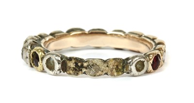 Lot 2 - A Georgian silver and gold, garnet, split pearl and diamond full hoop ring