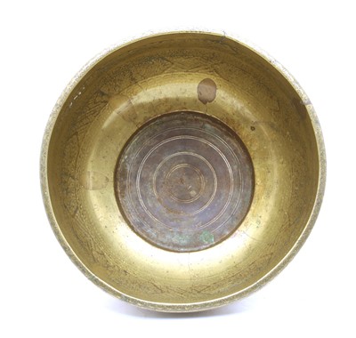 Lot 325 - A 19th century Persian brass footed bowl