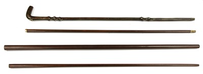 Lot 763 - A patent compass walking stick and three stick shafts