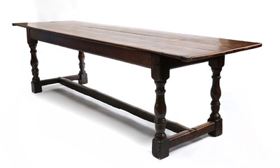 Lot 792 - An oak plank top refectory table with cleated ends