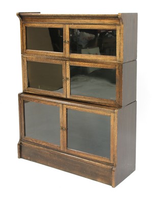 Lot 772 - An oak sectional bookcase 'The Oxford'