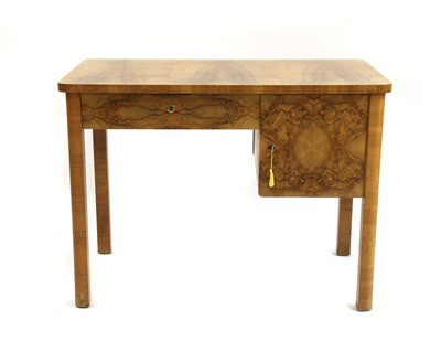 Lot 416 - An Art Deco walnut desk