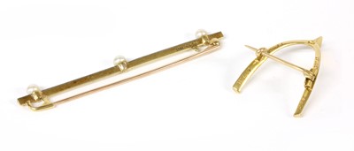 Lot 22 - A Victorian gold wishbone brooch